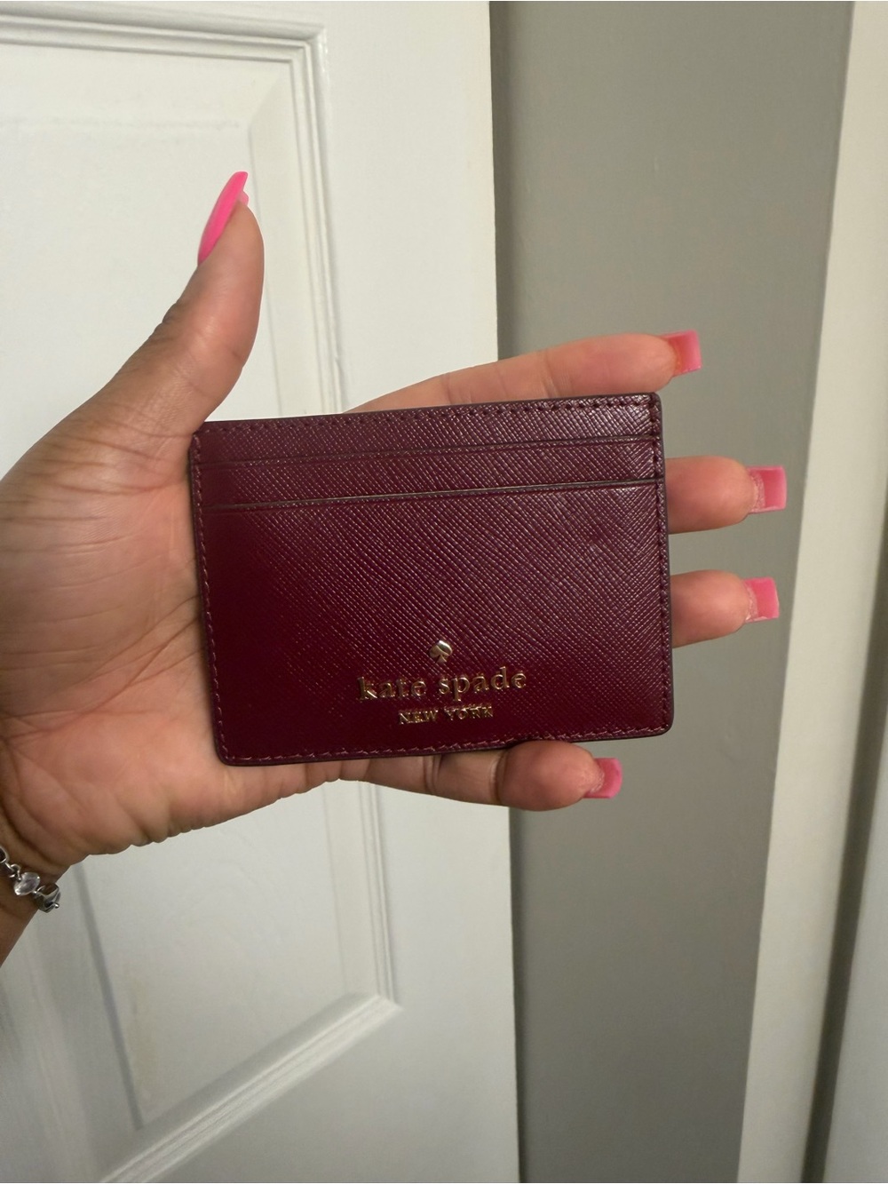 kate spade Burgundy Leather Card Case with Gold Logo